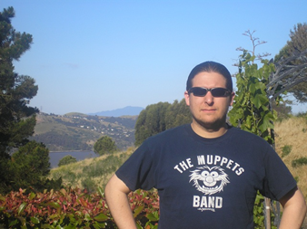 Photo of David Matteri in front of a mountain.