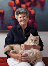 Janet Grove holding her cat.