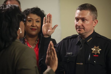 CSUEB alumnus Sean Whent being sworn in as interim Oakland Police Chief.