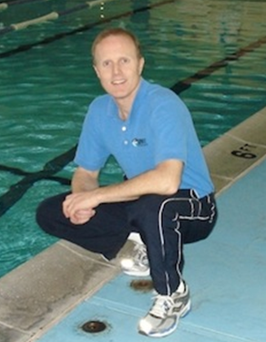 CSUEB alumnus Steve Victorson by a pool.